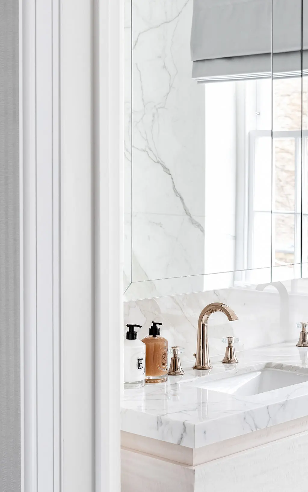 white bathroom gold interior