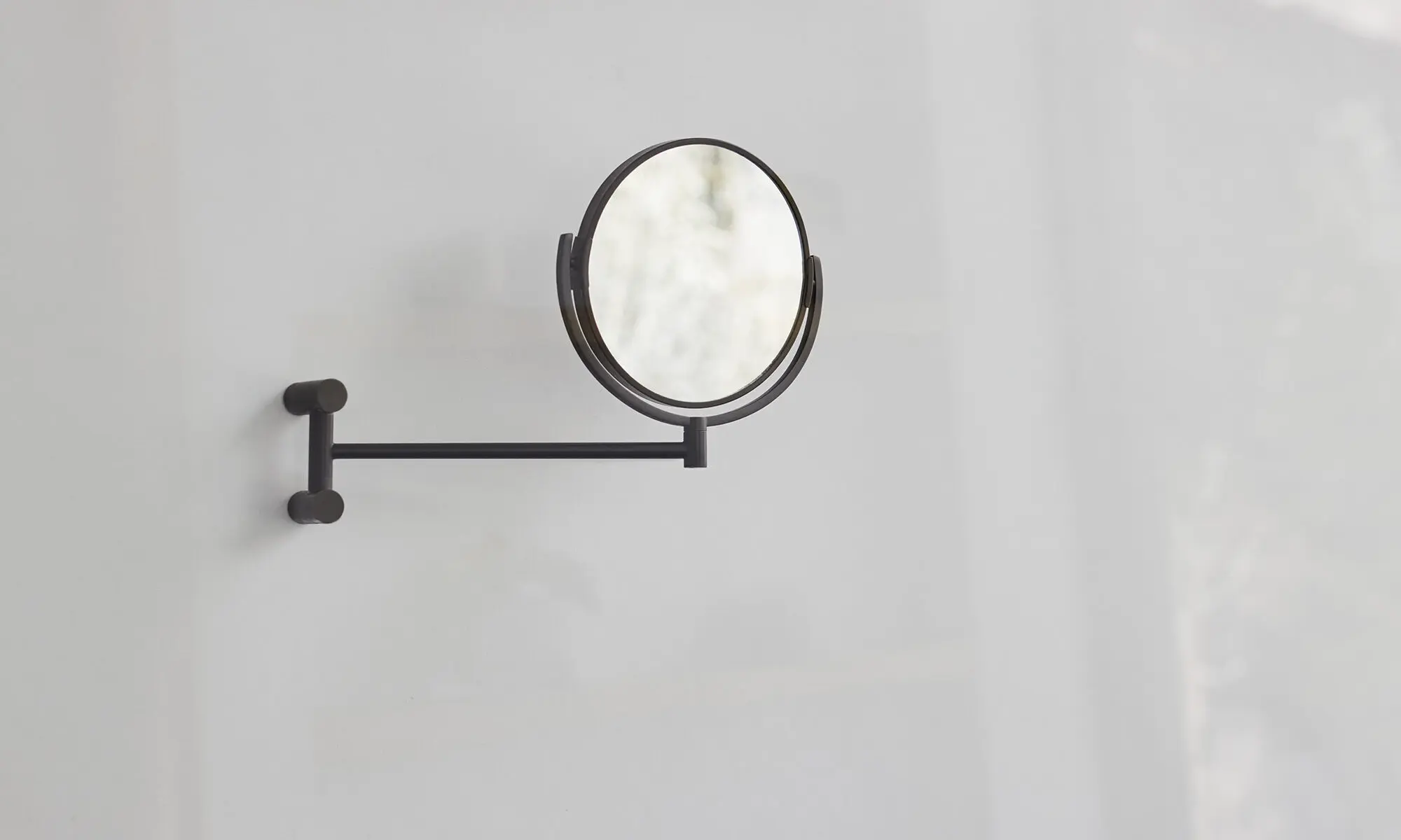 Wall mounted vanity mirror by Samuel Heath