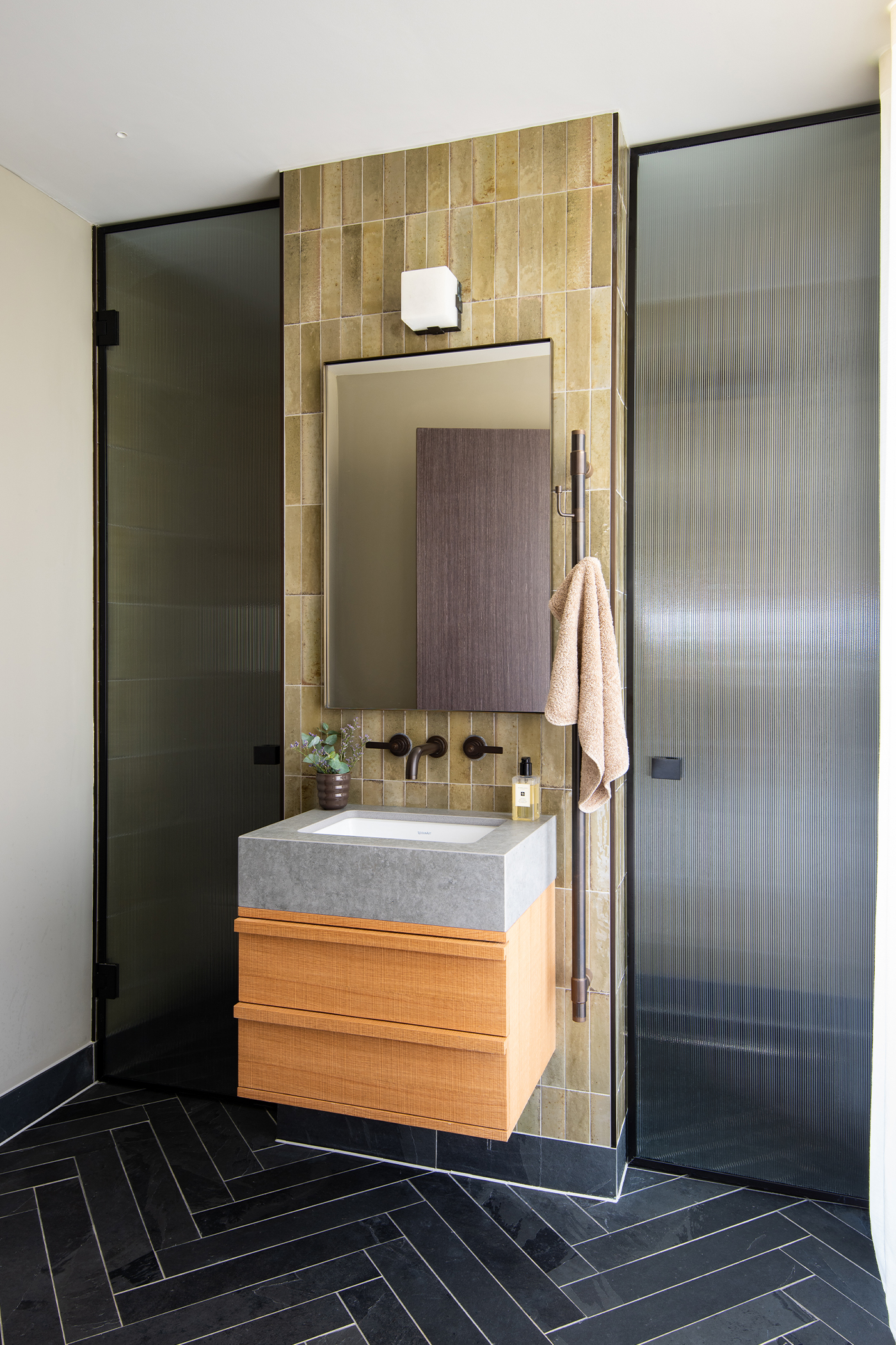 Boot room with walk-in shower and Landmark Pure basin tap by Samuel Heath