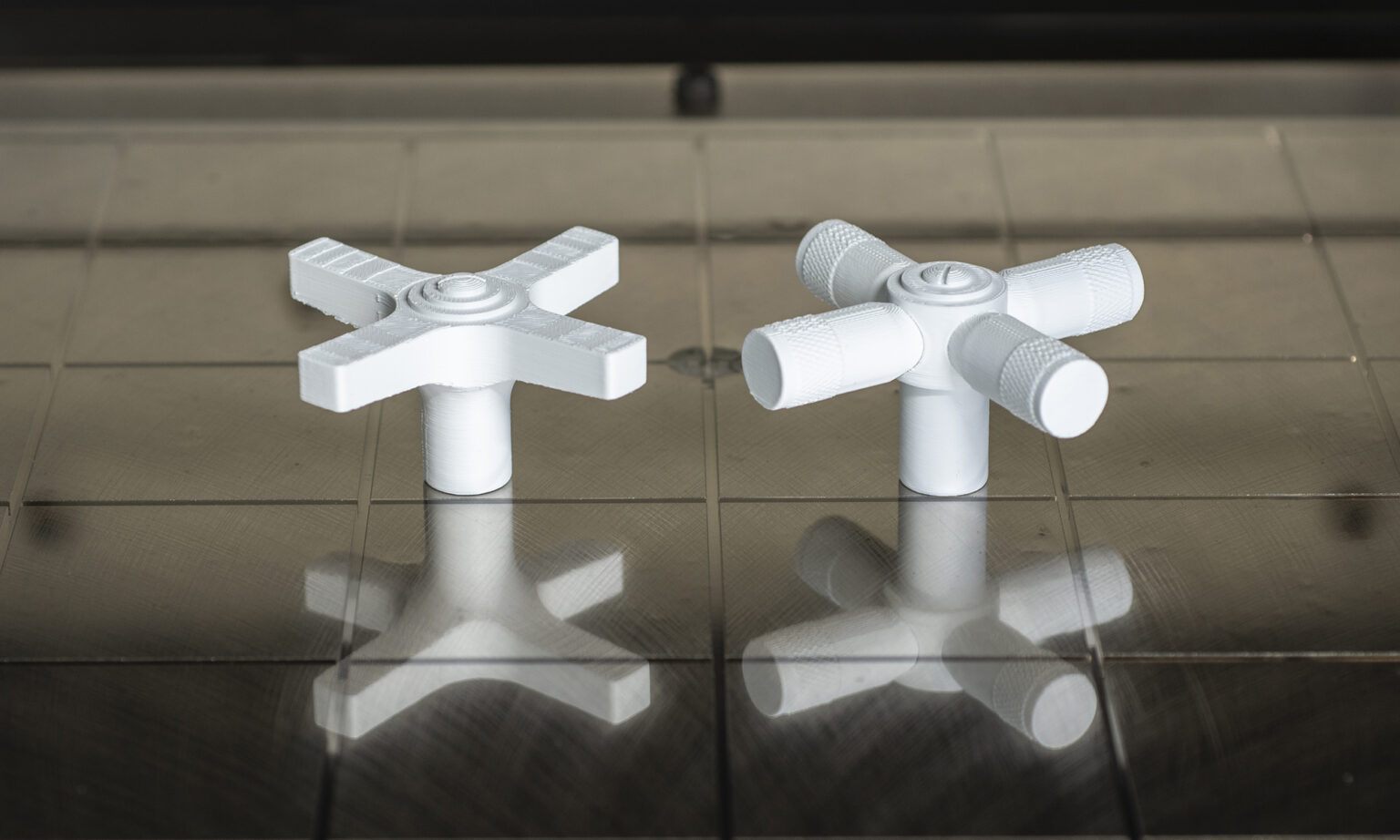 3D prototypes of control valves inside a carbon fiber machine.