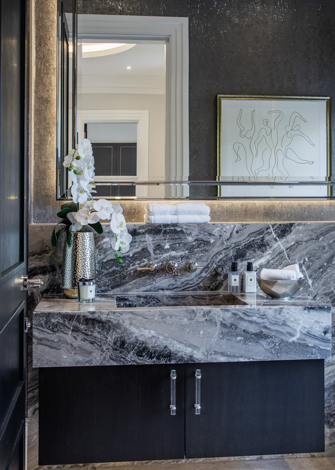 A grey marble basin with Samuel Heath Style Moderne basin tap in Polished Nickel