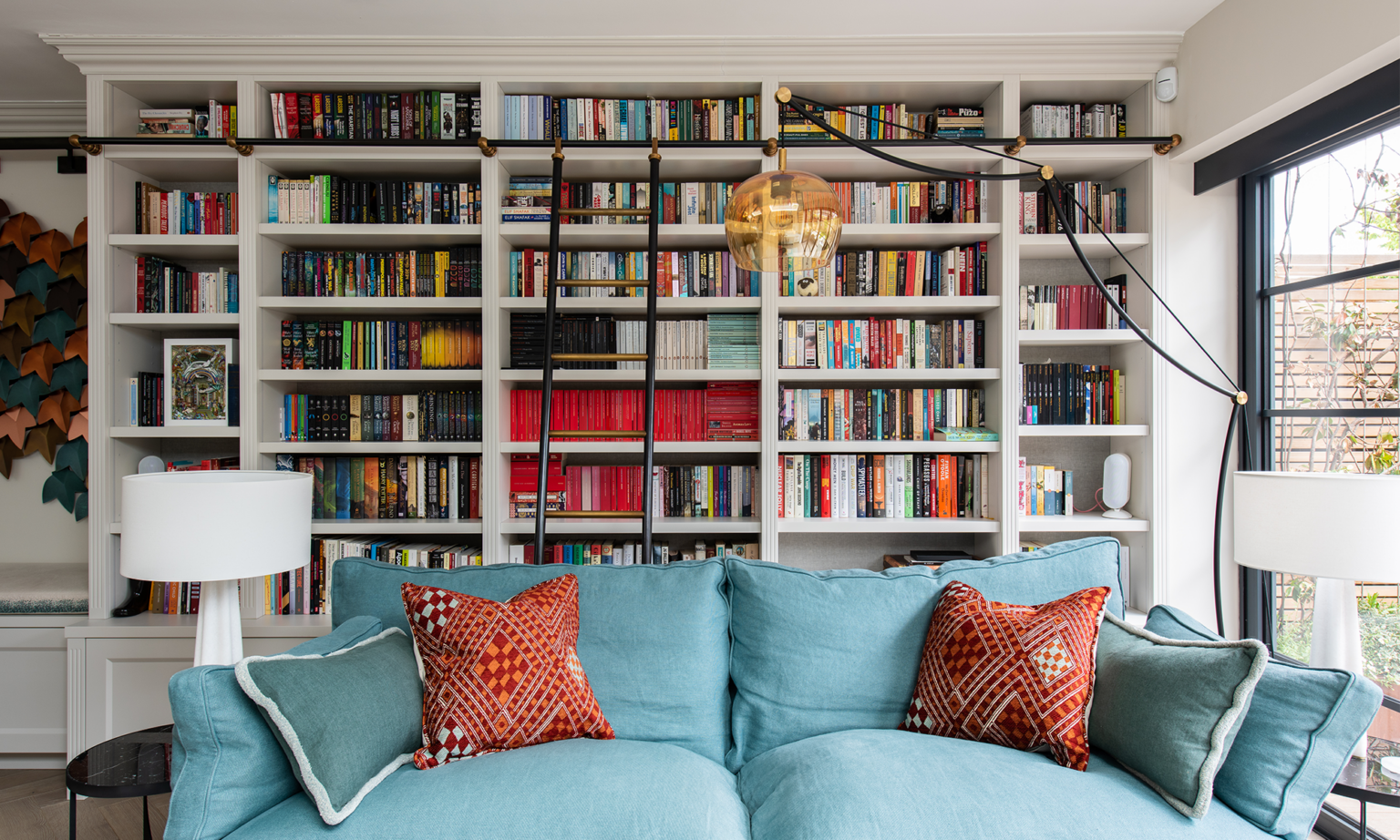large bookcase and sofa