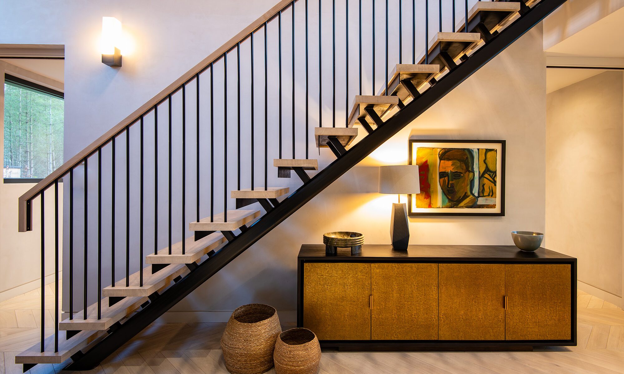 Dark grey stair balustrade and hallway accents