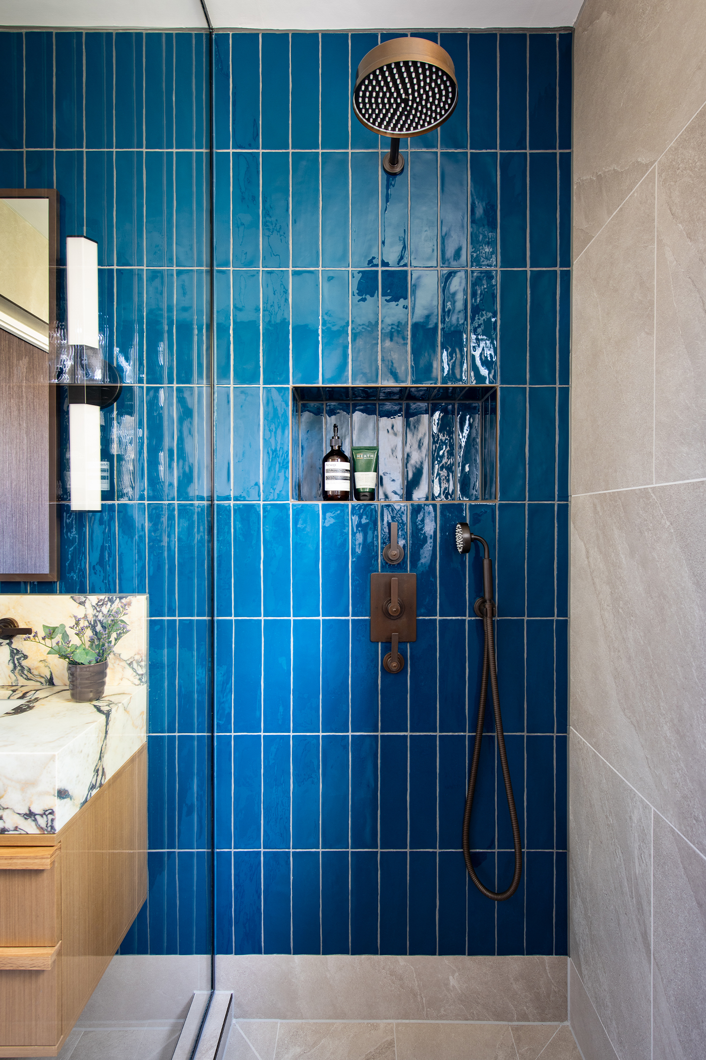 principal ensuite shower with deep blue tiles and LMK pure concealed shower samuel heath