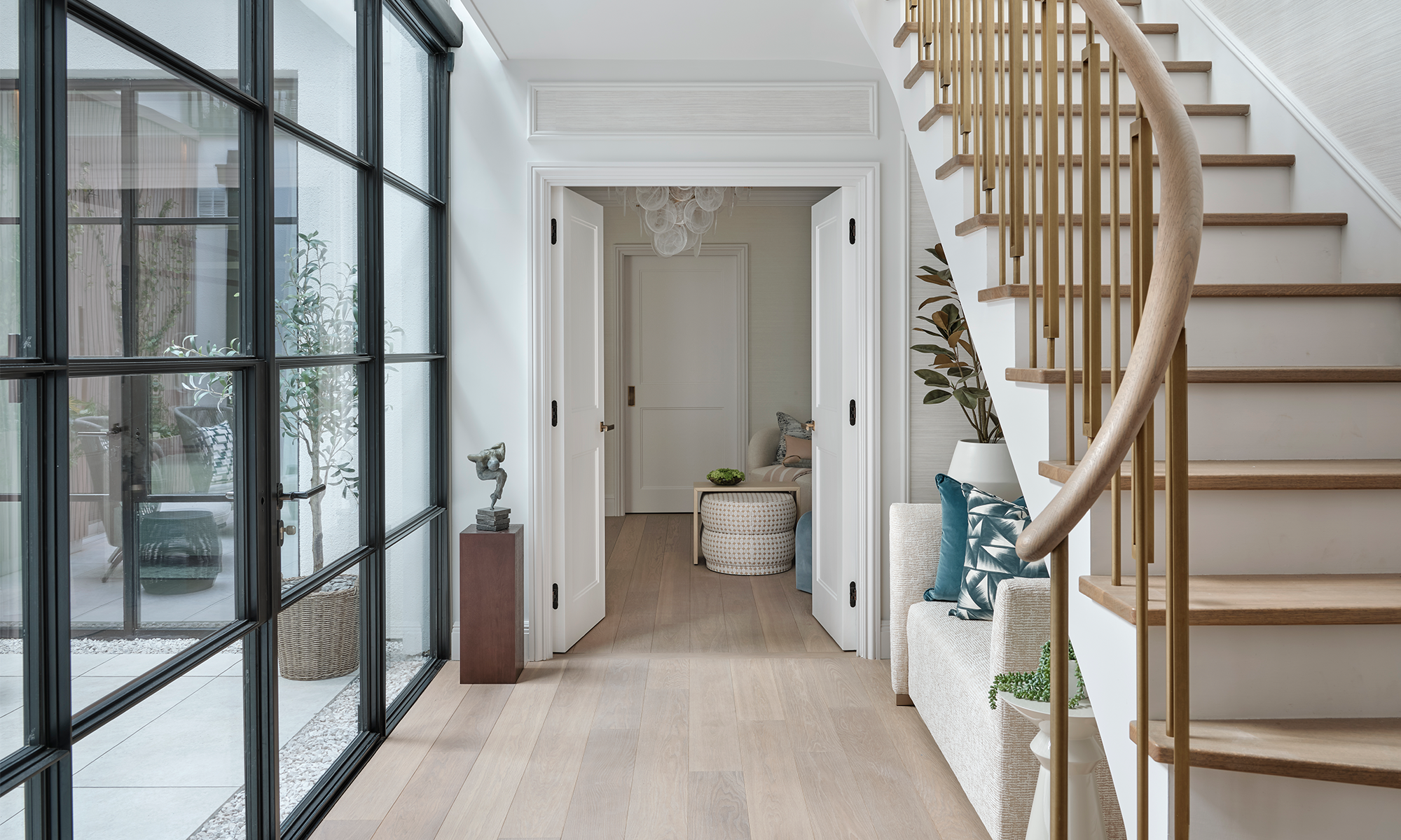 large glass window and wooden staircase